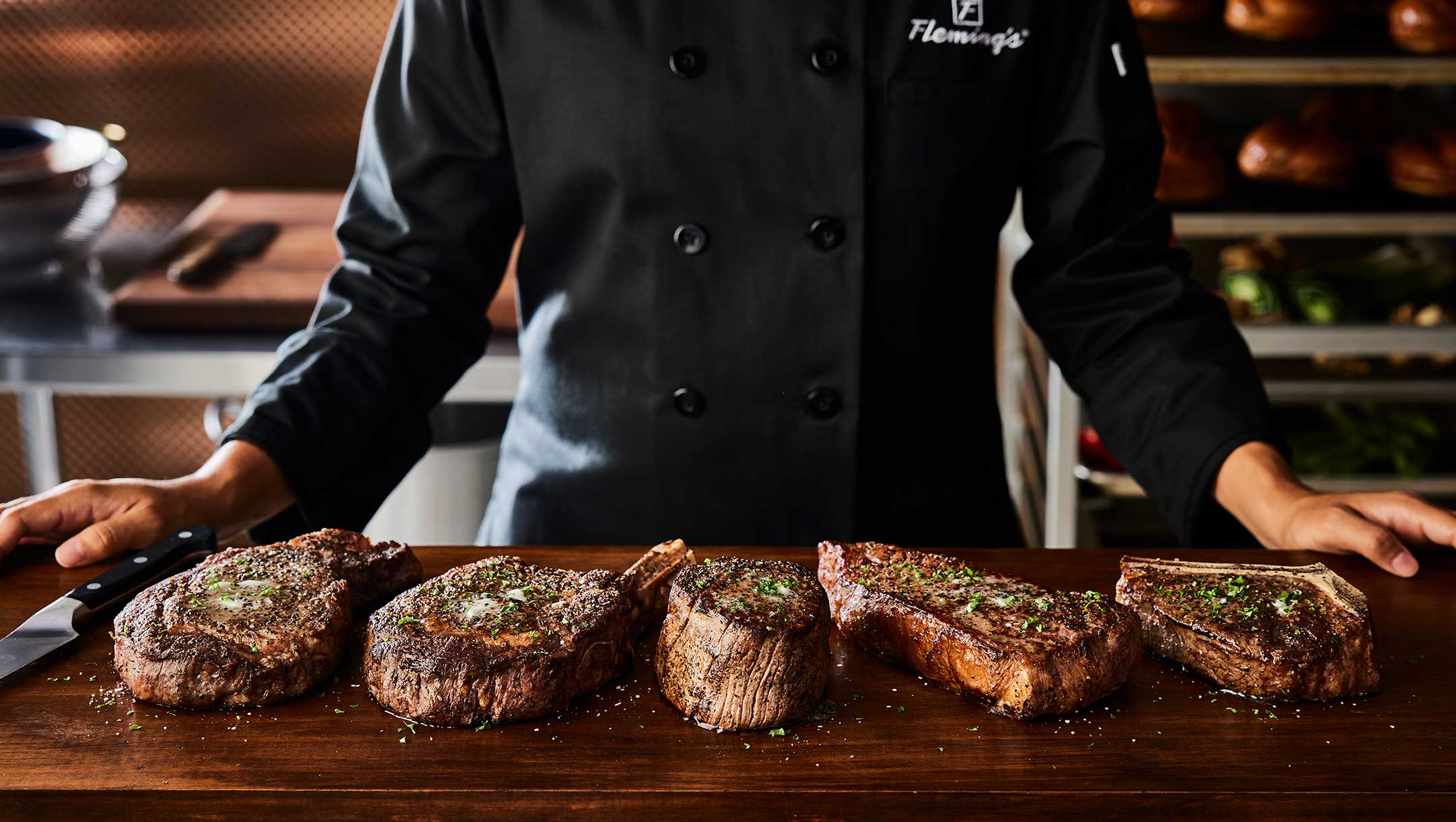 Fleming's steak lineup: Dry-aged ribeye, bone-in ribeye, filet mignon, new york strip and the bone-in filet