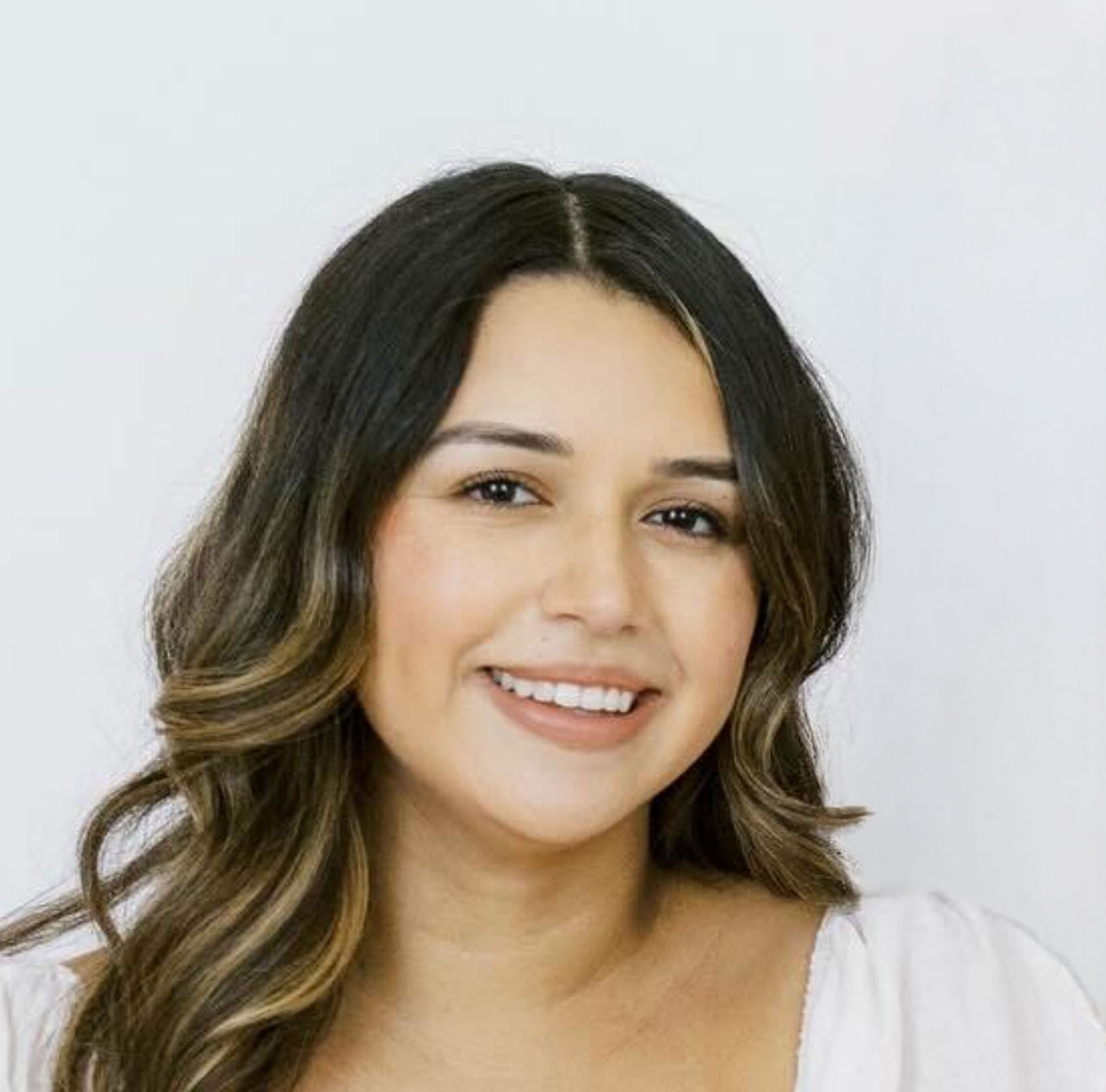 Headshot of Christine Guerrero, the Marketing Manager for Glory Days Grill