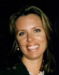 Headshot of Deb Hinson, the President at Roy’s Hawaiian Cuisine