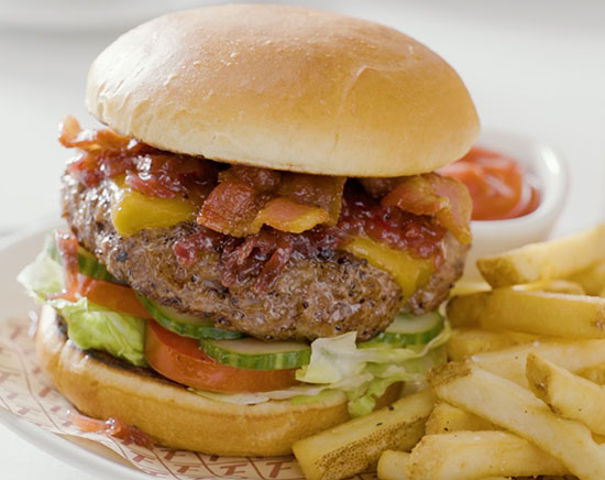 Strategy sandwich - burger with fries from a screenshot of a video captured by Acquired Taste for Fleming's Prime Steakhouse